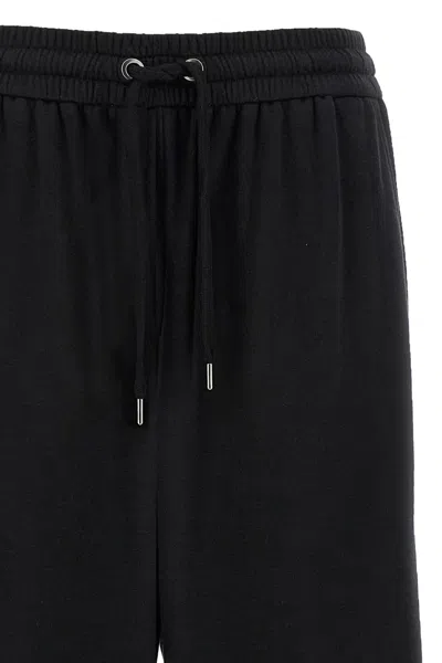 Brunello Cucinelli Shiny Trims Joggers With Back And Side Pockets In Black