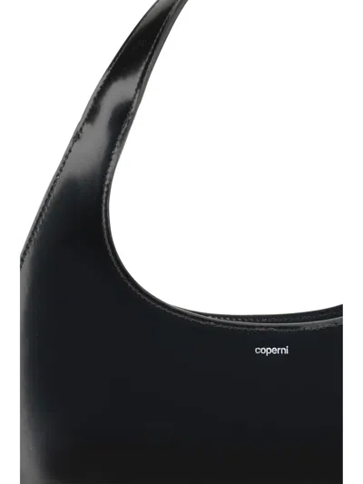 Coperni Curved Glossy Top Handle Bag In Black