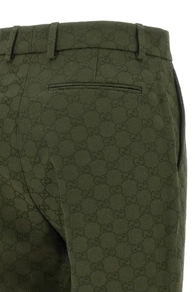 Gucci Gg Jacquard Cotton-blend Bootcut Pants In Green