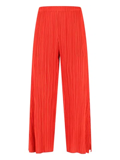 Pleats Please Wide-leg Cropped Trousers With Distinctive Pleated Texture In Red