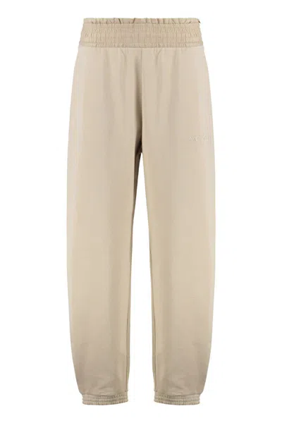 Moncler Sport Trousers With Patch And Elastic Ankle Cuffs In Brown