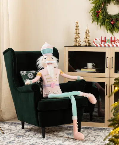 Glitzhome 60" Christmas Oversized Fabric Nutcracker With Dangle Legs In Multi