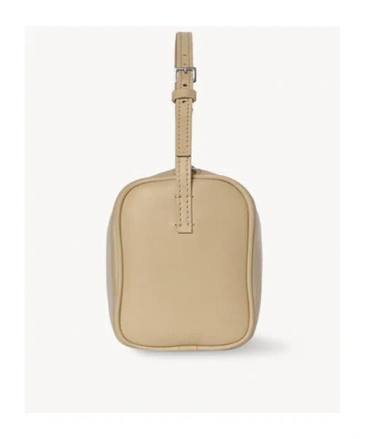 The Row 90s Top-handle Bag In Silk Leather In Sand