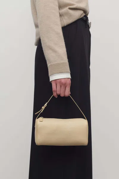 The Row 90s Top-handle Bag In Silk Leather In Sand