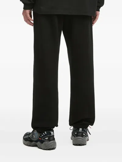 Izzue Elasticated-cuff Track Pants In Black