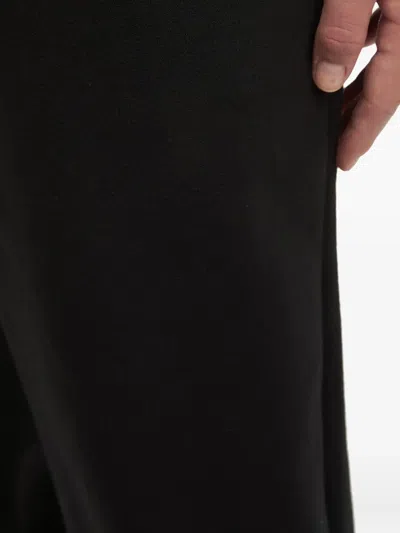 Izzue Elasticated-cuff Track Pants In Black