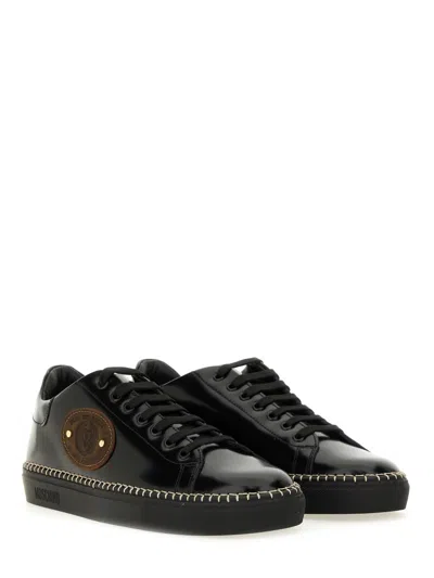 Moschino Round Toe Sneakers With Flat Sole And Stitching In Black