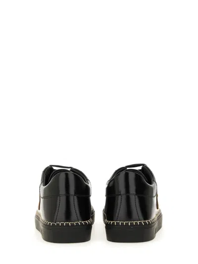 Moschino Round Toe Sneakers With Flat Sole And Stitching In Black