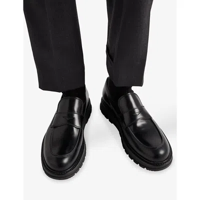 Prada Monolith Leather Loafers In Black