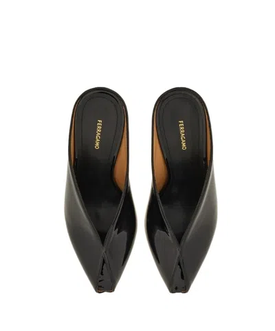 Ferragamo Leather Mules With Wedge Heel And Glossy Finish In Black