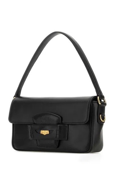 Miu Miu Handbags. In Black