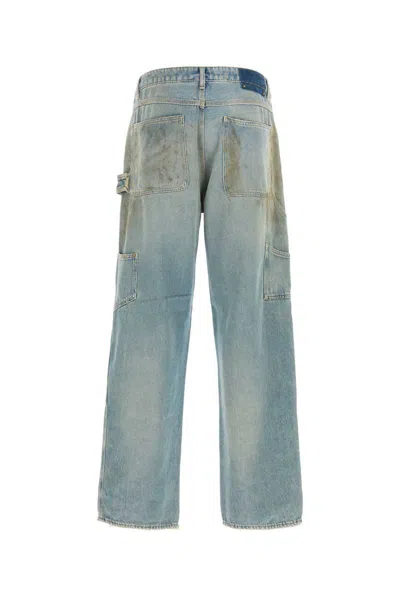 Golden Goose Sand Wash Jeans With A Distressed Effect In Blue