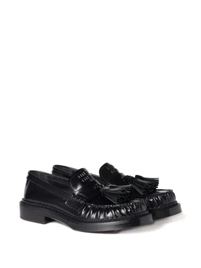Miu Miu Tassel Loafers In Polished Leather In Black