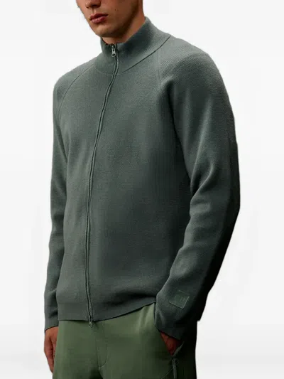 C.p. Company High Neck Zipped Cardigan With Raglan Sleeves In Green