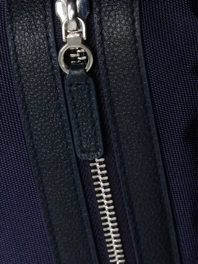 Fursac Leather-trimmed Suit Bag In Blue