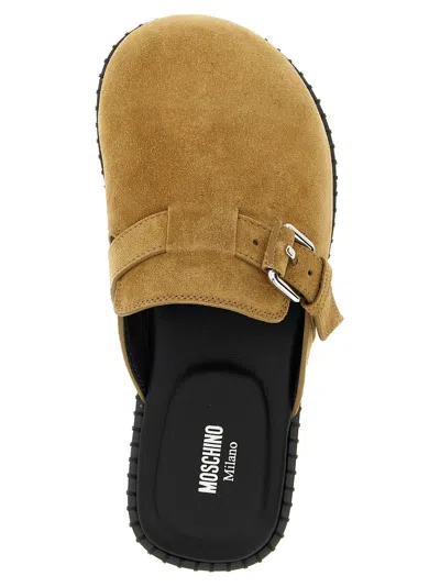 Moschino Suede Mules Featuring Buckle Detail In Brown