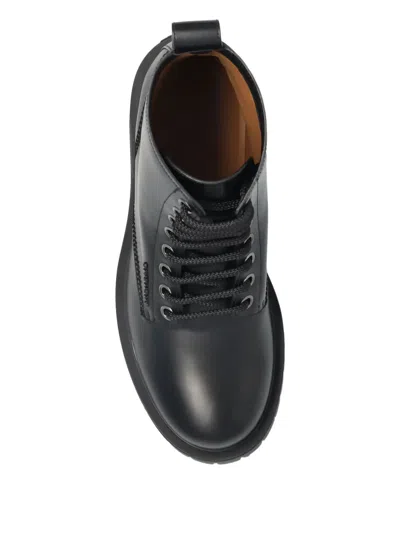 Givenchy Chunky Sole Leather Ankle Boots With Pull Tab In Black