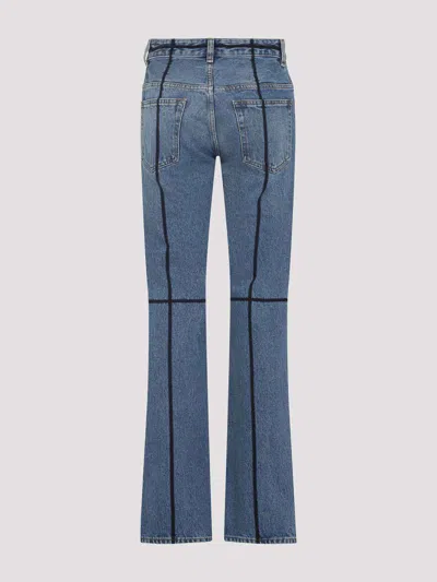 Mm6 Maison Margiela Mm6 By Maison Margiela Flared Blue Jeans With Contrasting Stitching In Blue