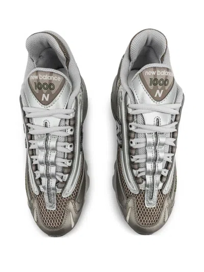 New Balance Contemporary Sneakers Featuring Mesh Panels And Reflective Accents In White