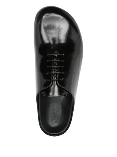 Jacquemus Round Toe Open Back Flat Sole Slippers In Black