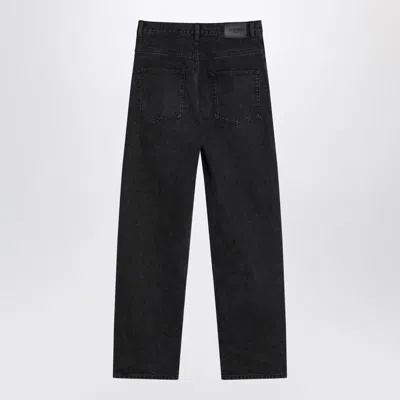 Saint Laurent Carrot-fit Jeans With A Washed Effect In Black