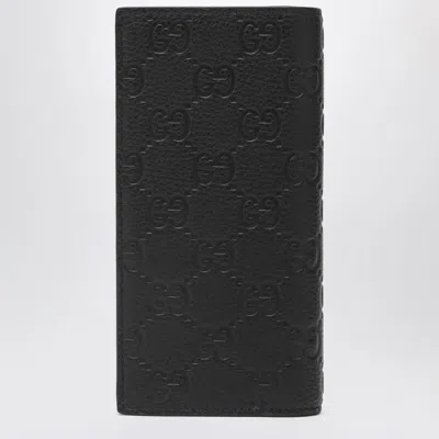 Gucci Gg Embossed Long Leather Wallet In Black