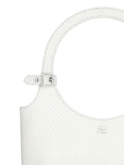 仿蛇皮压纹手提包