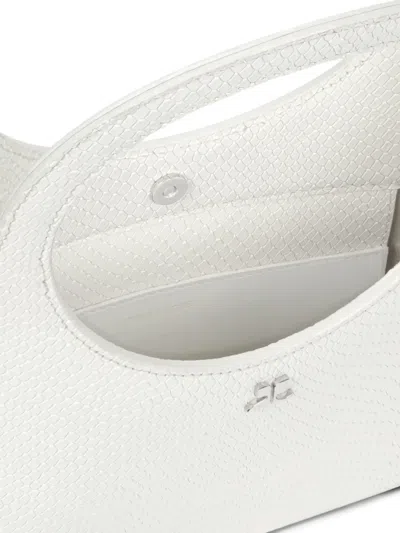 仿蛇皮压纹手提包