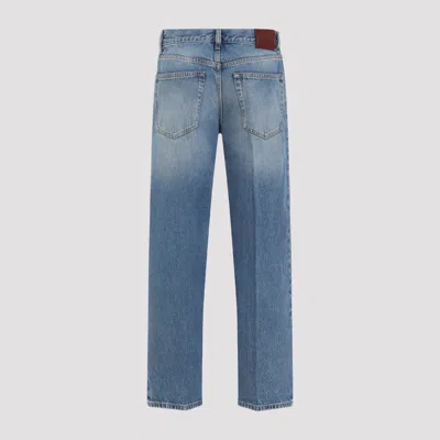 Gucci Blue Jeans With Logo Patch On The Rear And Faded Effect In Denim Woman