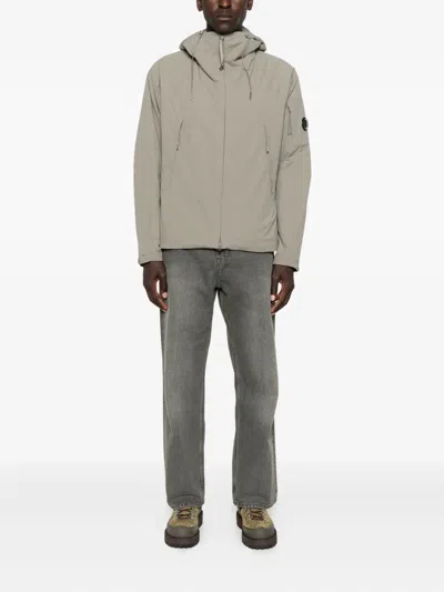 C.p. Company Relaxed-fit Minimalist Jacket With Adjustable Hood In Gray