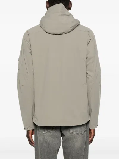 C.p. Company Relaxed-fit Minimalist Jacket With Adjustable Hood In Gray