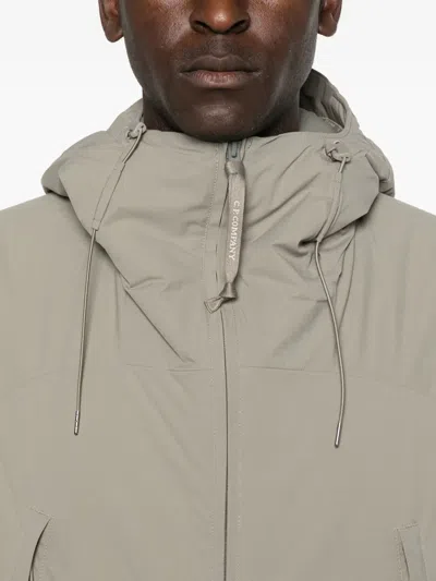 C.p. Company Relaxed-fit Minimalist Jacket With Adjustable Hood In Gray