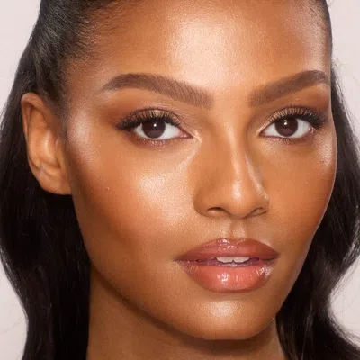 Charlotte Tilbury Unreal Skin Sheer Glow Tint Hydrating Foundation Stick - 12 Tan