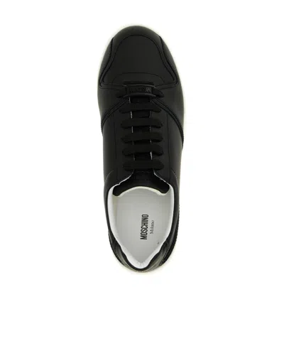 Moschino Kevin Sneakers Featuring Contrast Sole In Black