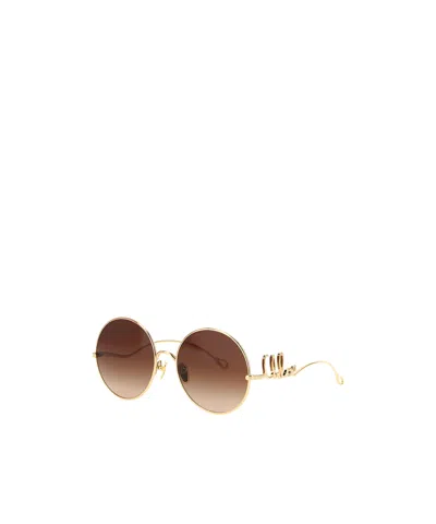 Chloé Round Frame Sunglasses Featuring Curved Temples In Brown