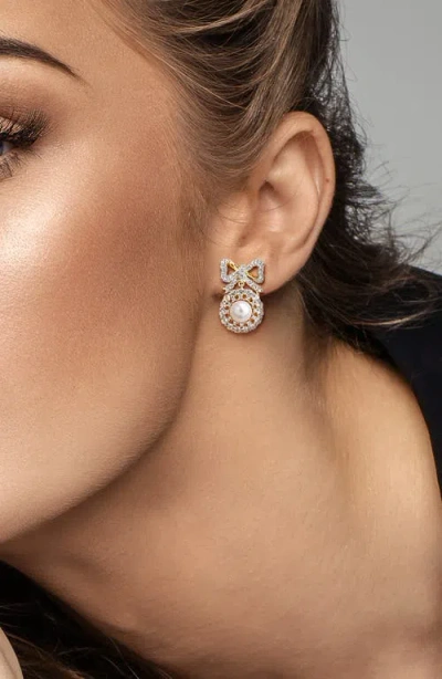 Delmar 6-6.5mm Cultured Freshwater Pearl & White Topaz Bow Stud Earrings In Gold