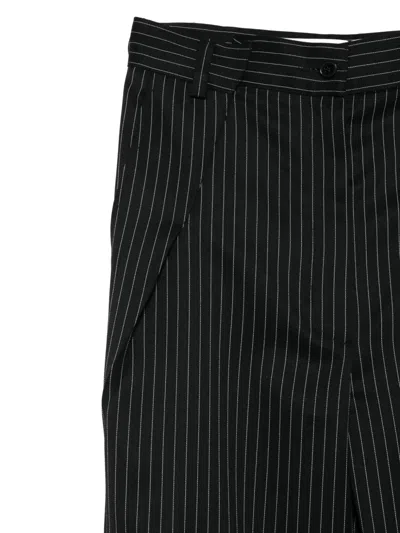 Almaz Pinstripe Knee-split Trousers In Black