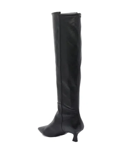 Stuart Weitzman Leather Knee High Pointed Toe Boots In Black
