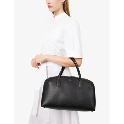 Totême Leather Handbag With Engraved Logo On The Front In Black