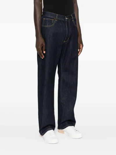 五口袋排扣牛仔裤