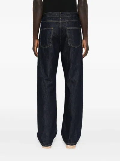 五口袋排扣牛仔裤