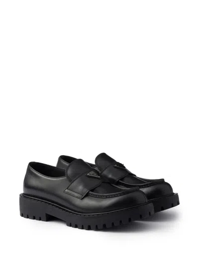 Prada Monolith Leather Loafers In Black