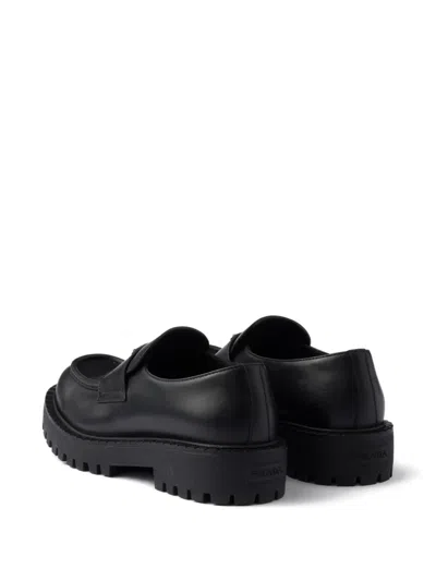 Prada Monolith Leather Loafers In Black
