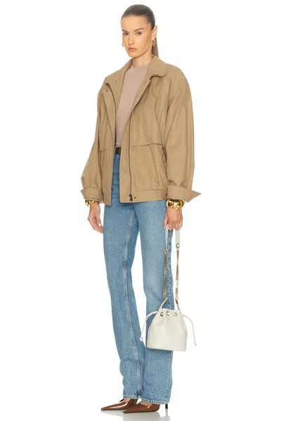 Saint Laurent Cassandre Bucket Bag In Lambskin In Sand