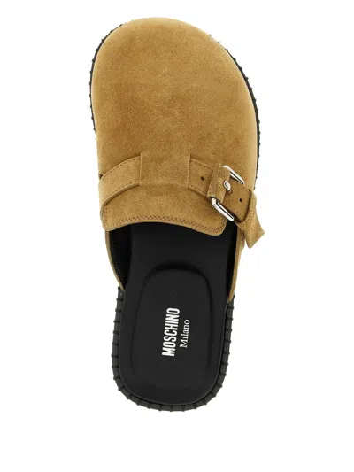 Moschino Suede Mules Featuring Buckle Detail In Brown