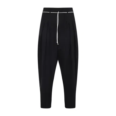 Mordecai Tapered Black Trousers With Pleated Front In Black