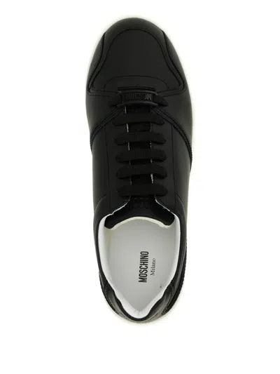 Moschino Kevin Sneakers Featuring Contrast Sole In Black