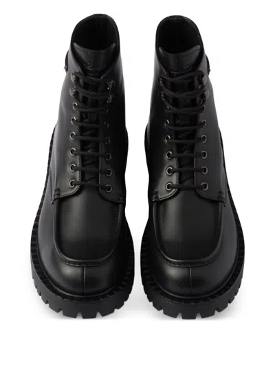 Prada Laced Leather Booties In Black