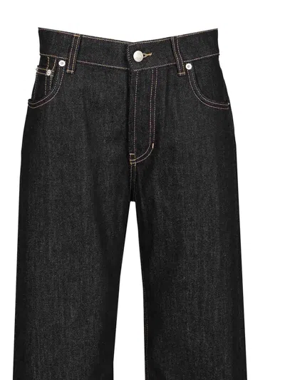 Alexander Mcqueen Wide Leg Denim Jeans In Indigo In Black