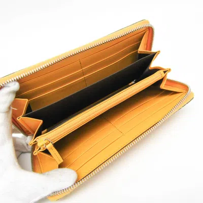 Pre-owned Gucci Gg Embossé Yellow Leather Wallet  ()